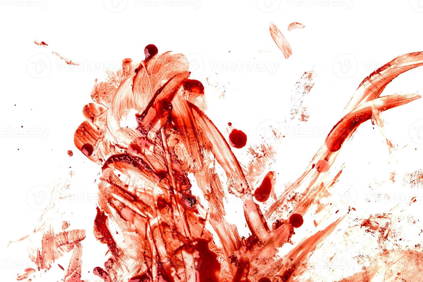 éclaboussures de sang sur fond blanc photo