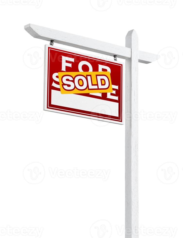 face à gauche vendu à vendre signe immobilier isolé sur fond blanc. photo