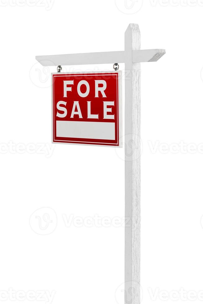 face à gauche à vendre signe immobilier isolé sur fond blanc. photo