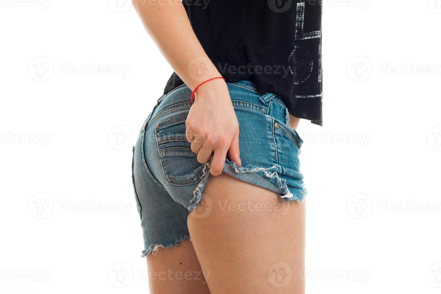 belles fesses d'une jeune fille en short en jean photo