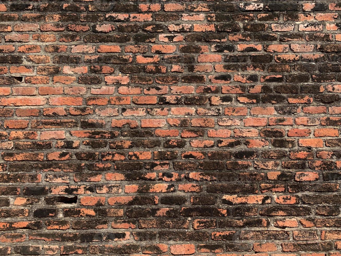 texture de mur de briques rouges, vieux fond de mur photo