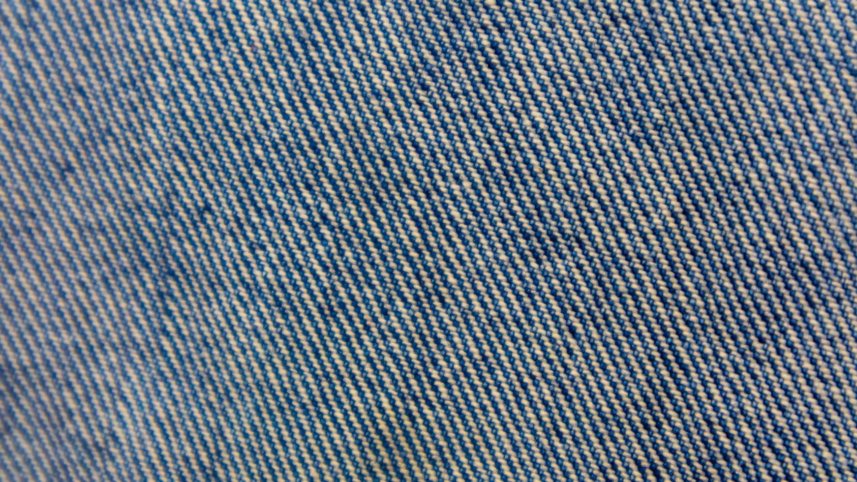 texture de jeans bleus comme arrière-plan photo