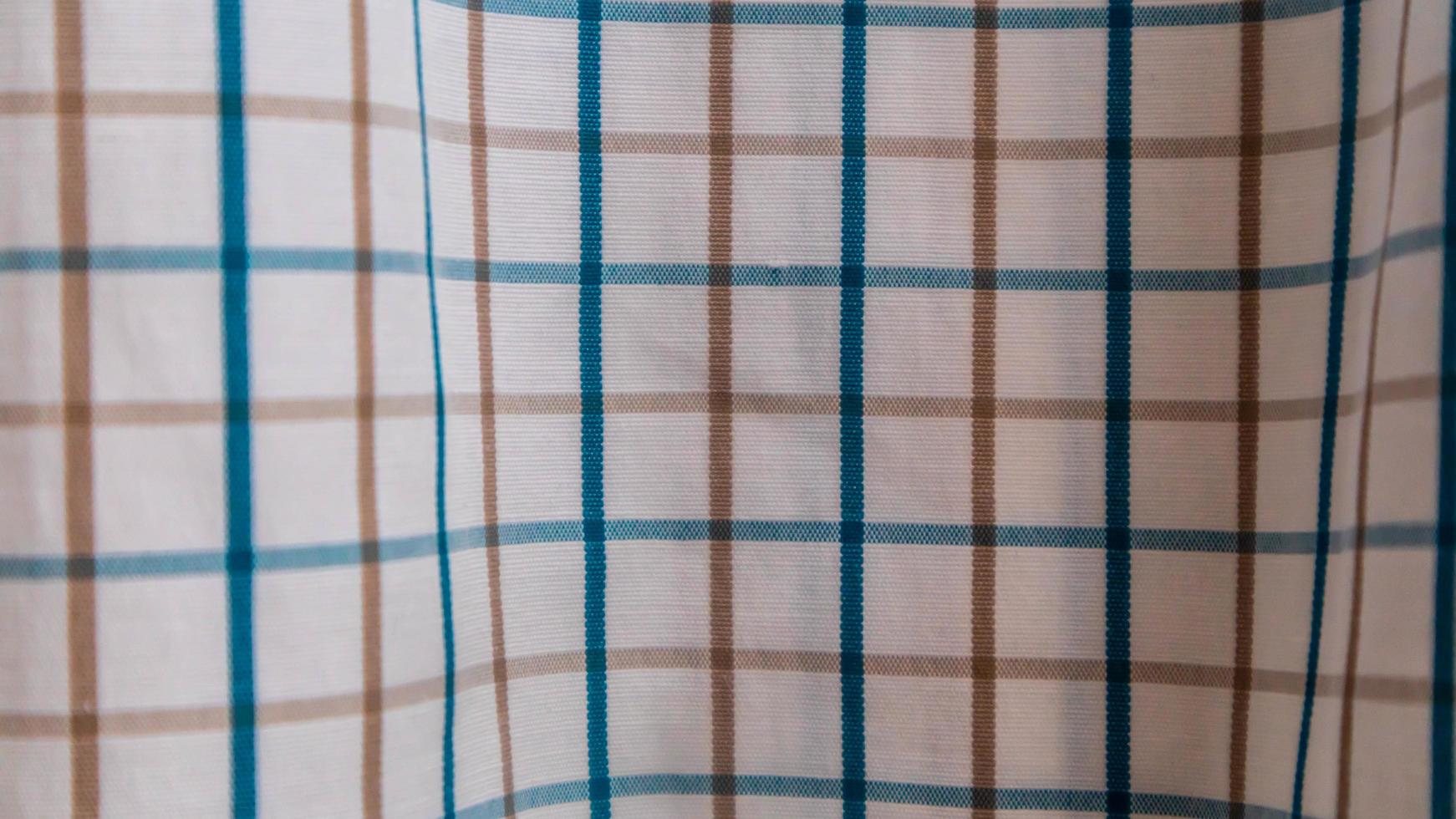 texture de tissu blanc avec vichy en arrière-plan photo