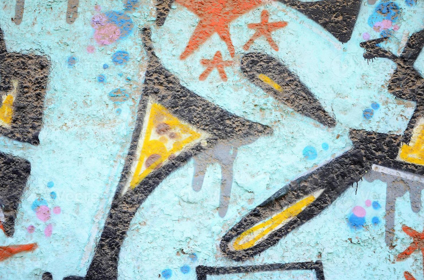 texture d'un fragment du mur avec une peinture graffiti, qui y est représentée. une image d'un dessin de graffiti en photo sur des sujets de street art et de culture graffiti