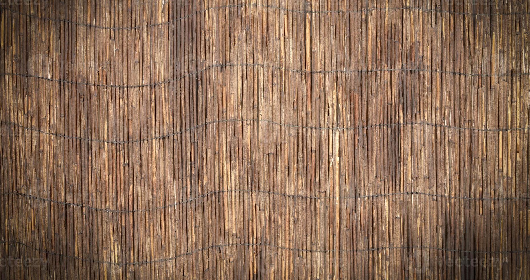 texture de fond de mur de roseau. ressemble à du bambou. fermer photo