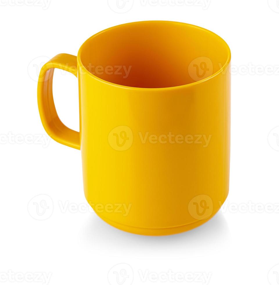 Tasse tasse orange verre sur fond blanc isolement photo