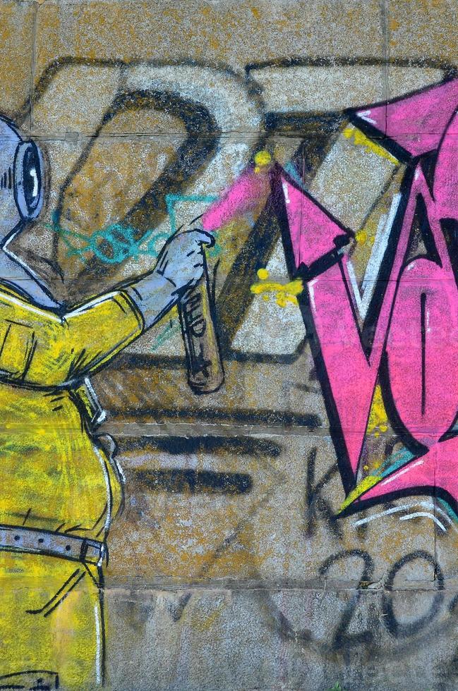 fragment de dessins de graffitis. le vieux mur décoré de taches de peinture dans le style de la culture de l'art de la rue. plongeur effrayant photo