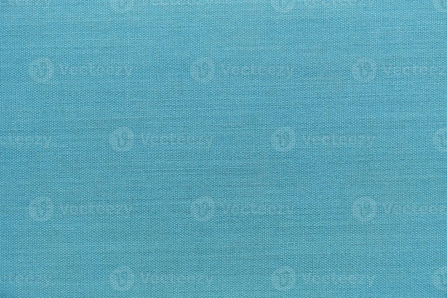 fond abstrait, texture de tissu turquoise. photo