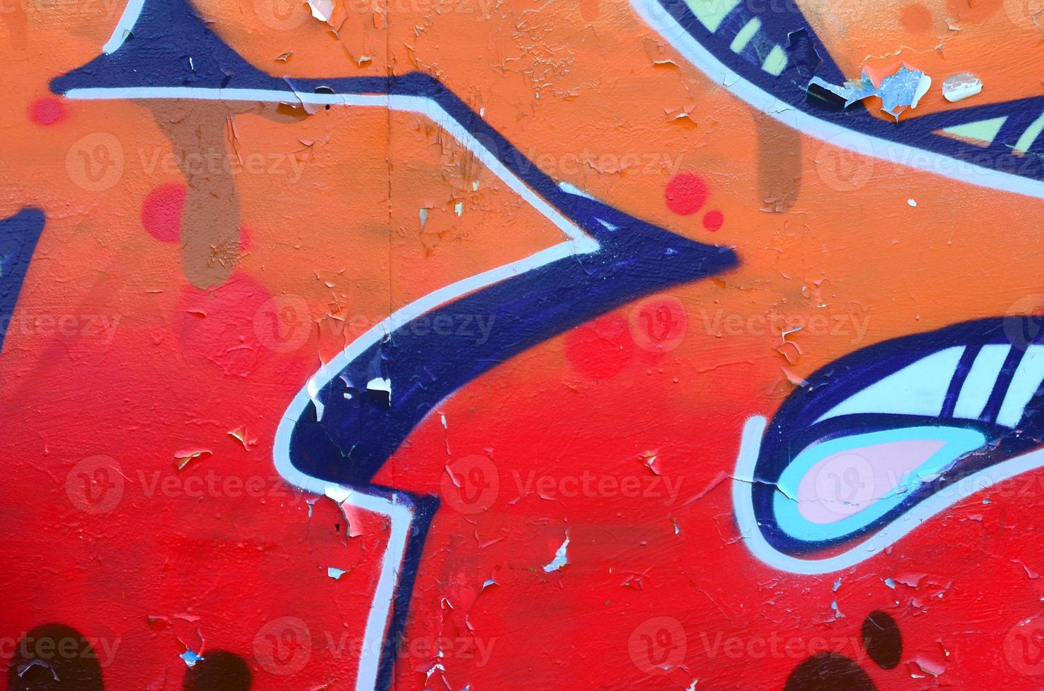 art de rue. image d'arrière-plan abstraite d'un fragment d'une peinture graffiti colorée dans des tons beige et orange photo