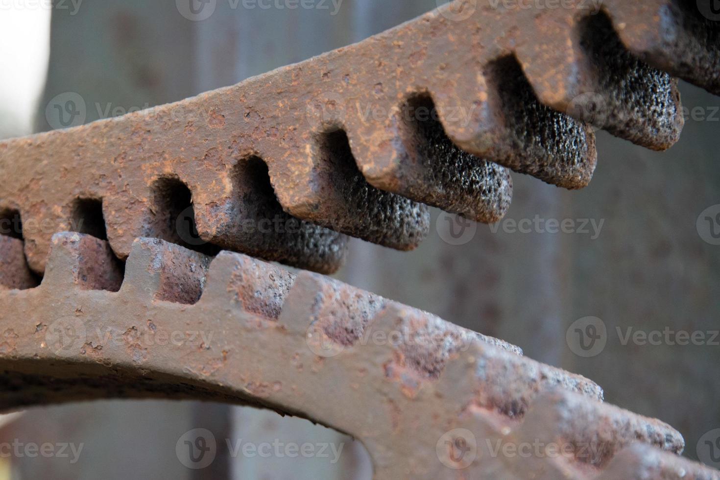 Ancien engrenage en fer rouillé close up detail photo