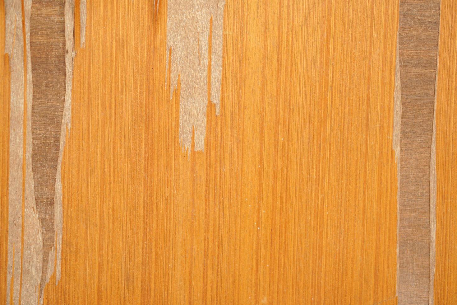le vieux plancher en bois a un motif de décomposition. photo