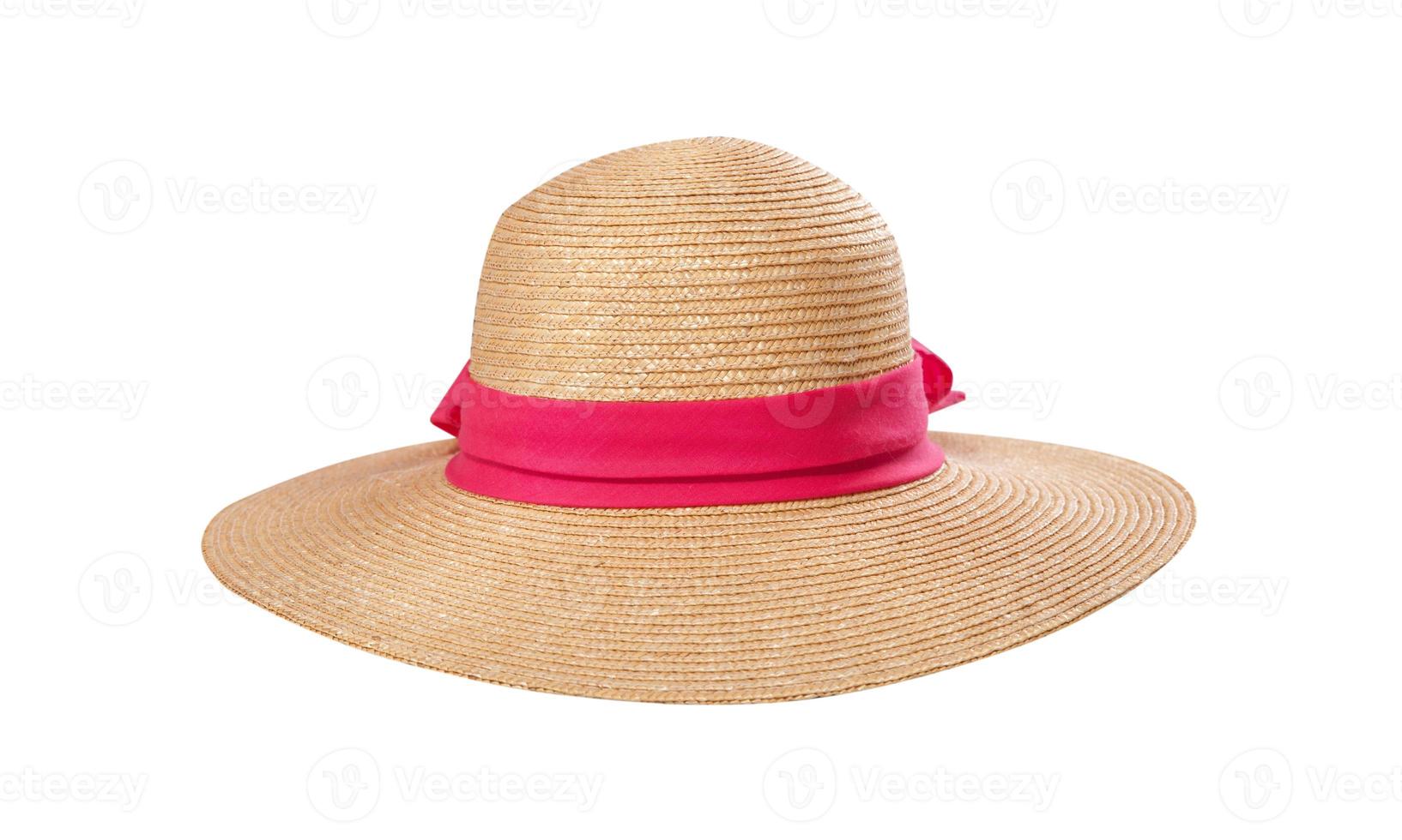 joli chapeau de paille avec ruban et archet sur fond blanc. chapeau de plage vue de dessus isolé photo