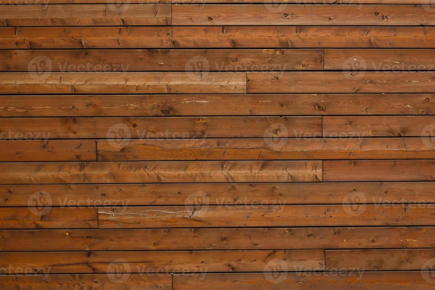 fond de texture en bois. bois de teck. mur de planches horizontales en bois photo