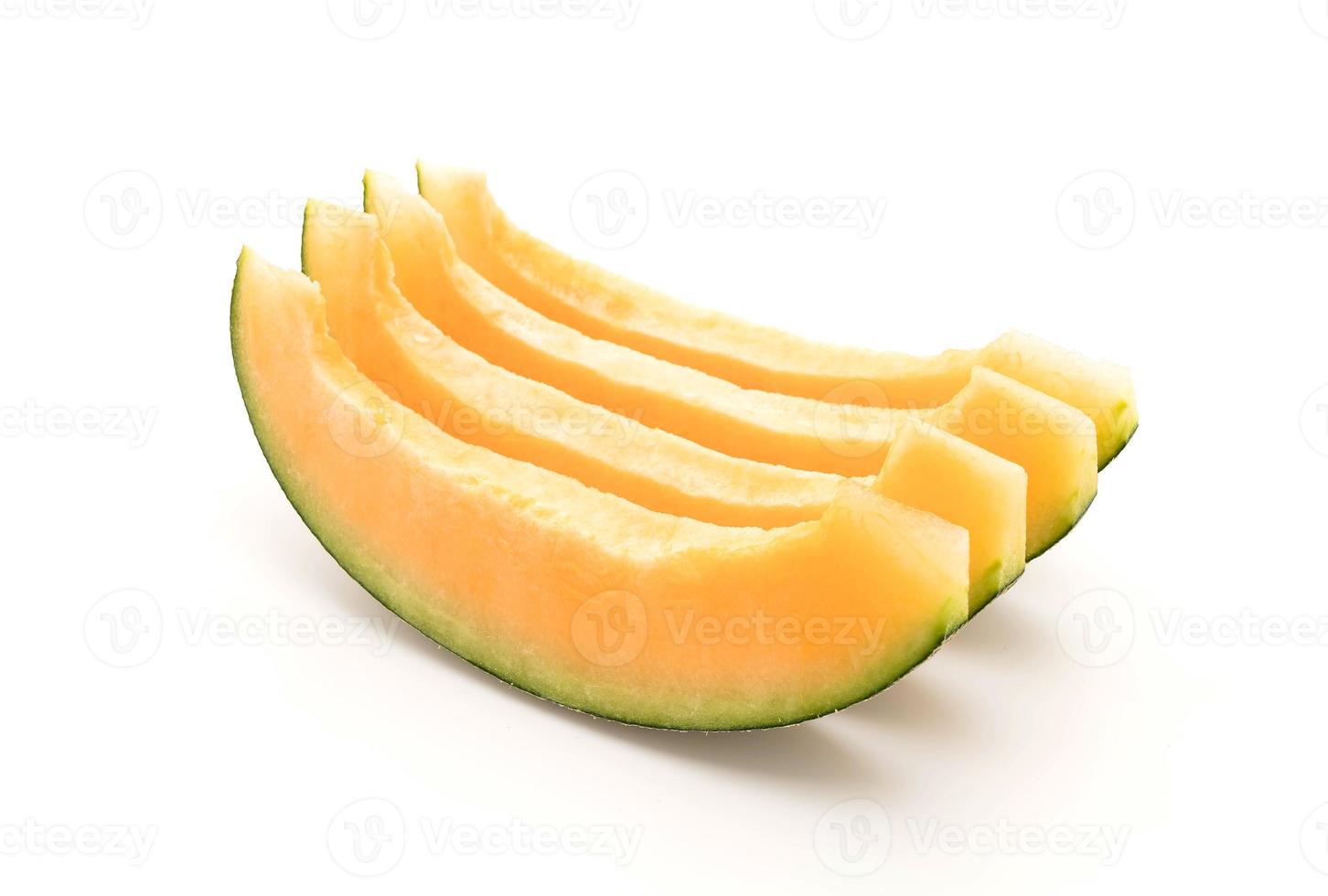 Melon cantaloup sur fond blanc photo