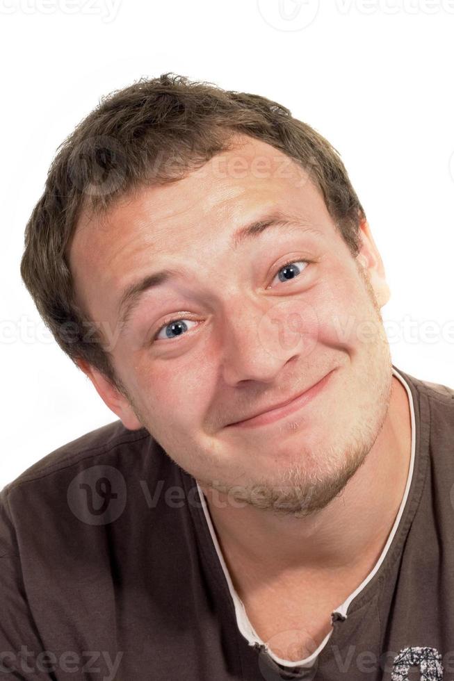 la personne d'un jeune homme souriant. une drôle d'image. isolé photo