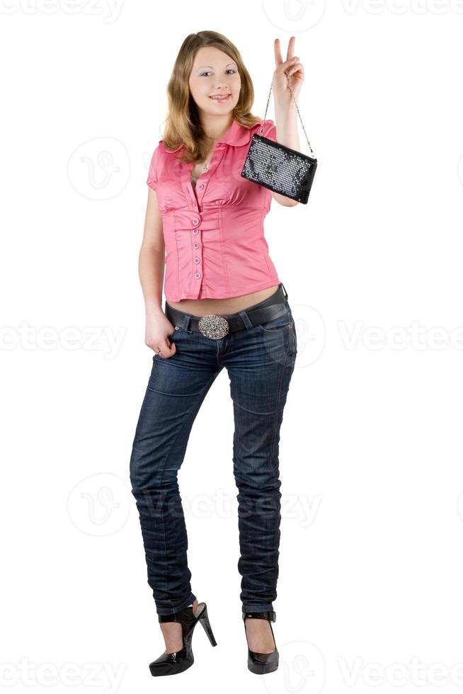 belle fille souriante avec un sac à main. isolé sur blanc photo