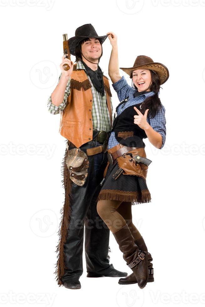 joyeux jeune cow-boy et cow-girl photo