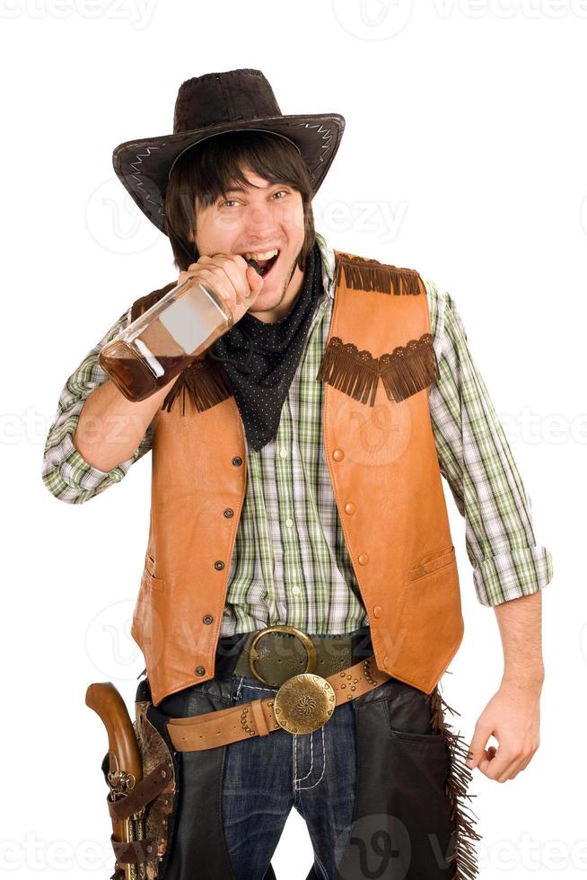 cow-boy avec une bouteille de whisky photo