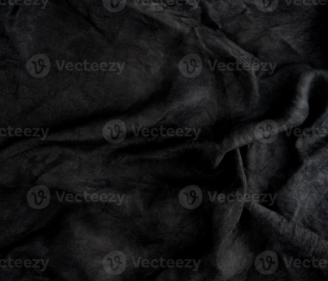 fragment de tissu de coton noir avec des vagues photo