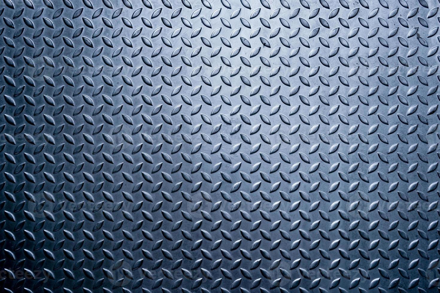 un fond de motif de plaque de diamant en métal, fond de texture en métal photo