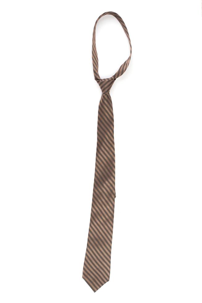 cravate marron isolé sur fond blanc photo
