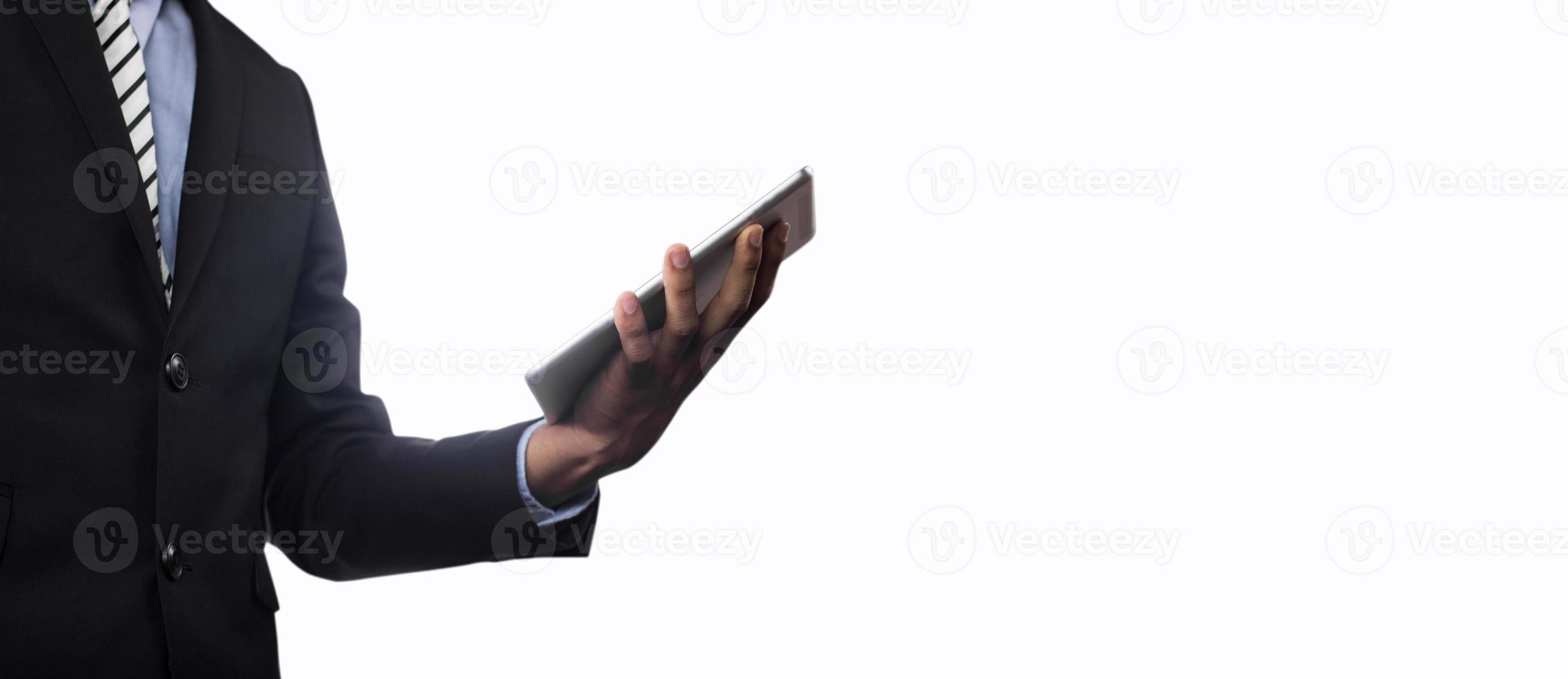 businesssman holding tablet isolé sur fond blanc photo