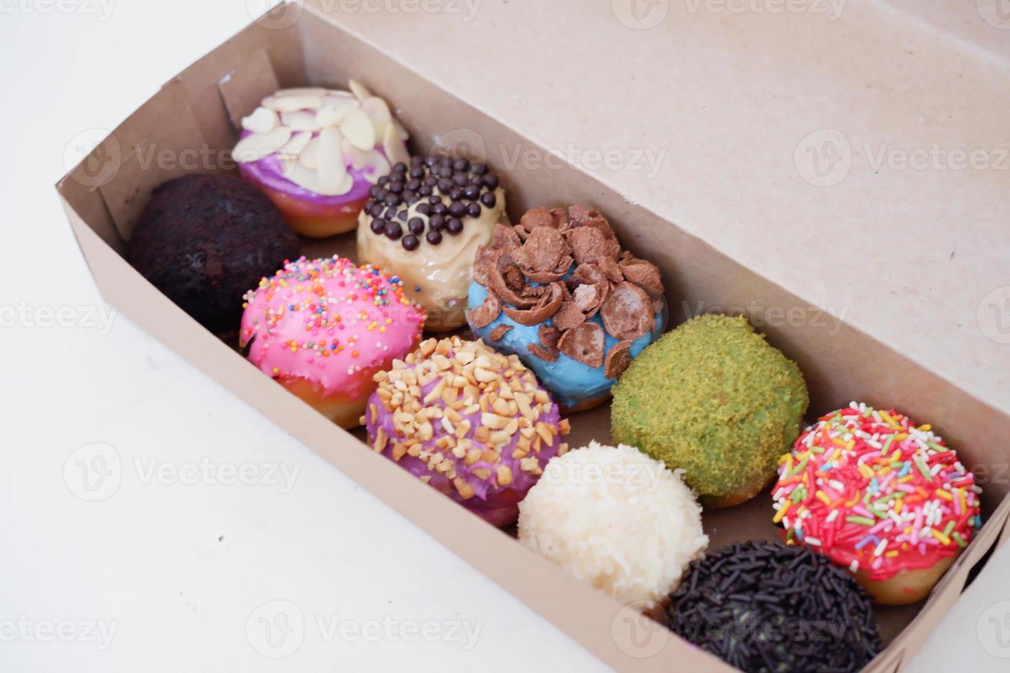 Balle beignets avec divers les saveurs comme une Contexte photo