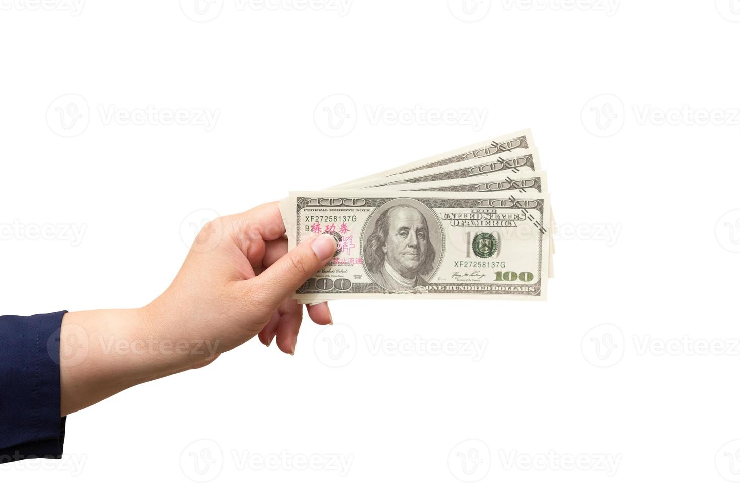 un main de une blanc adulte femme détient une quatre cent dollar facture sur une Contexte isolé ou Couper en dehors avec une coupure chemin. photo