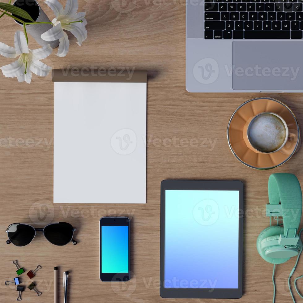 maquette de lieu de travail sur table avec smartphone et tablette photo