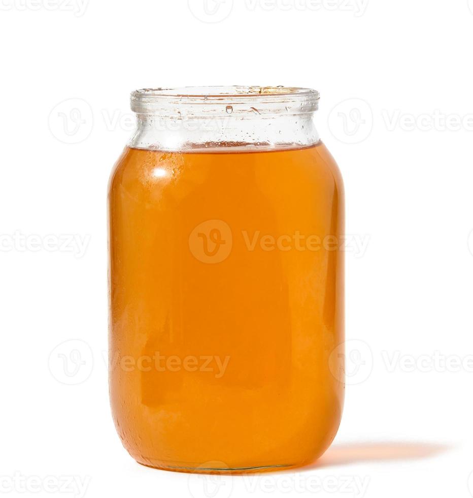 transparent verre pot avec abeille mon chéri sur une blanc isolé Contexte photo