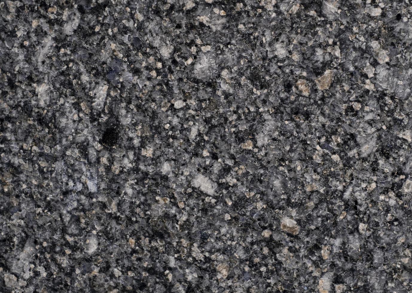 surface et fond de texture de granit gris pierre naturelle. matériau pour la texture de la décoration et la décoration intérieure photo