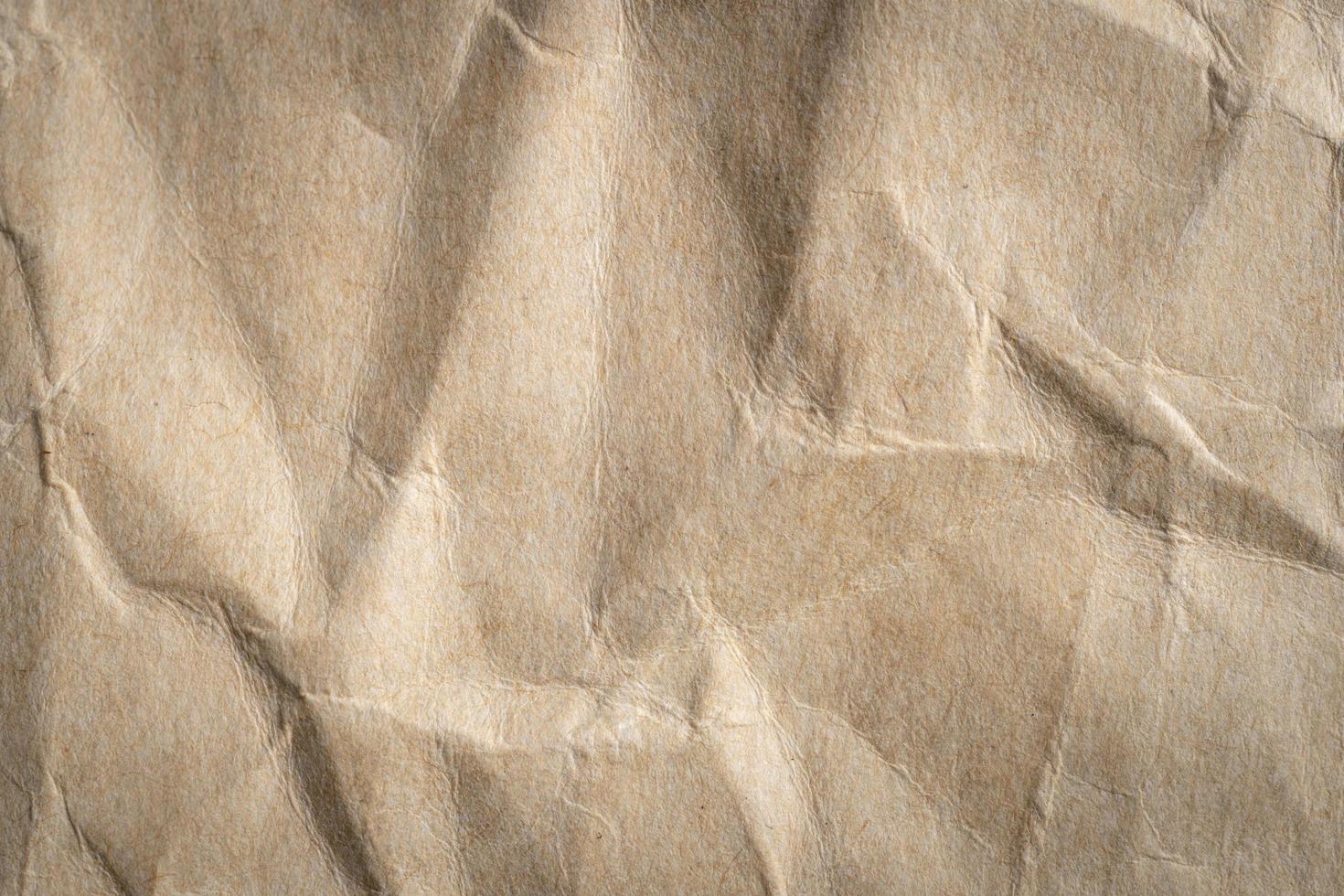 texture et fond de papier brun froissé photo
