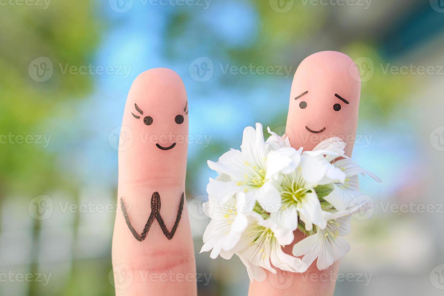 les doigts art de content couple. homme est donnant fleurs à femme. photo