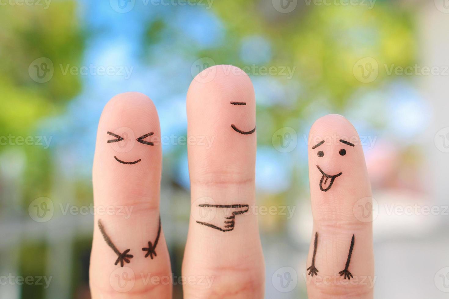 les doigts art de content famille. concept de enfant fait du visage et Parents rire. photo