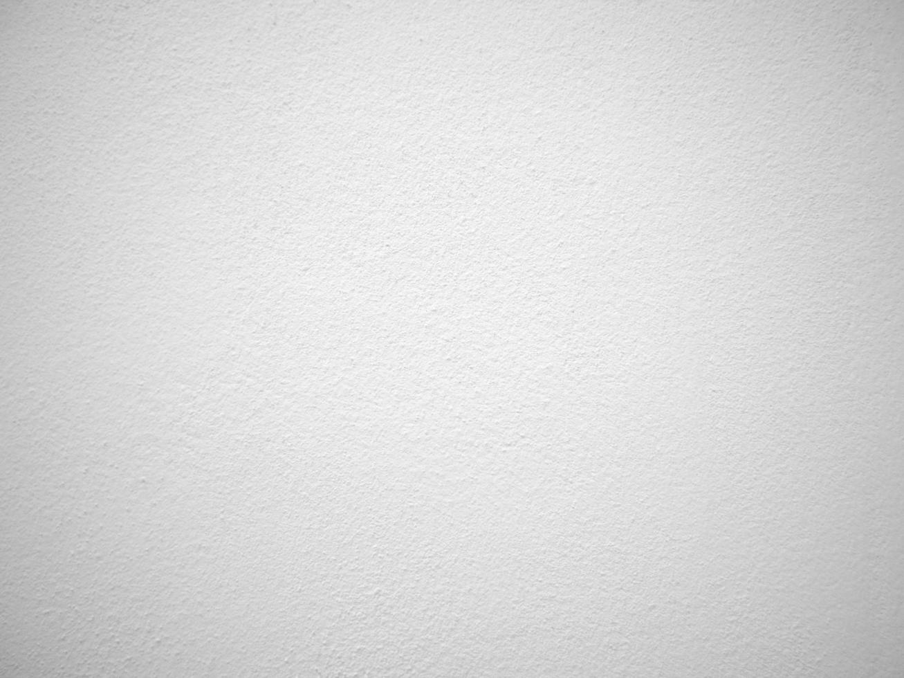 texture transparente du mur de ciment blanc une surface rugueuse, avec un espace pour le texte, pour un arrière-plan. photo