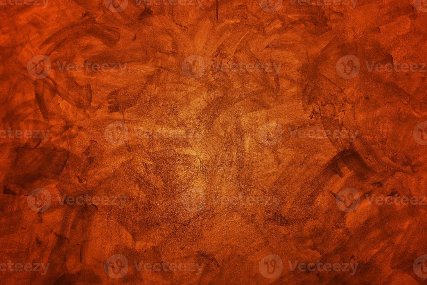 Mur de béton ou de ciment orange foncé pour le fond ou la texture photo