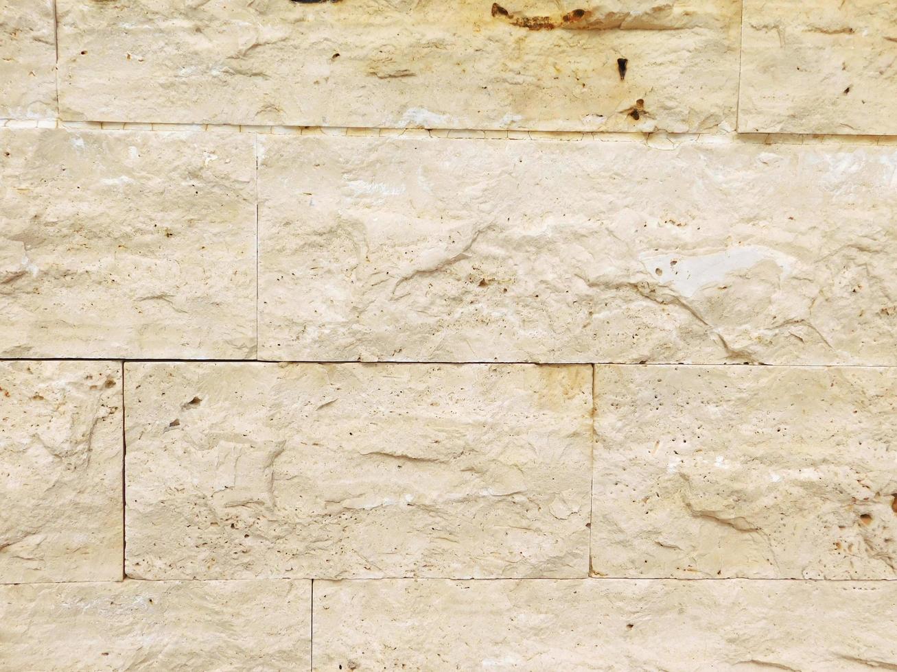 Mur de briques de béton ou de ciment pour le fond ou la texture photo