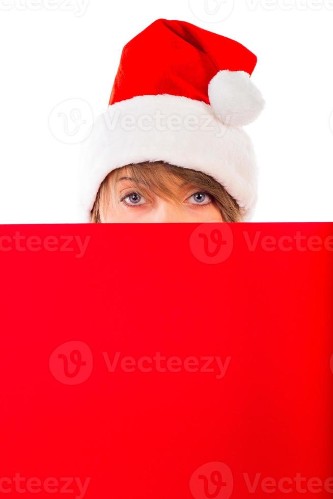 Noël fille avec rouge placard sur blanc photo