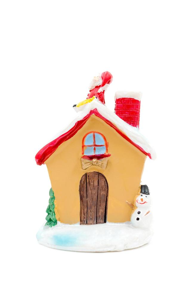 Figure de modèle de maison de Noël isolé sur fond blanc photo