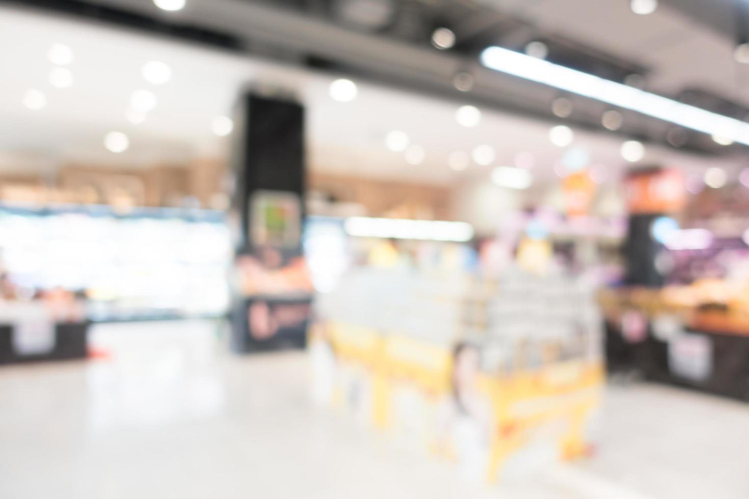 Intérieur abstrait de supermarché défocalisé pour le fond photo