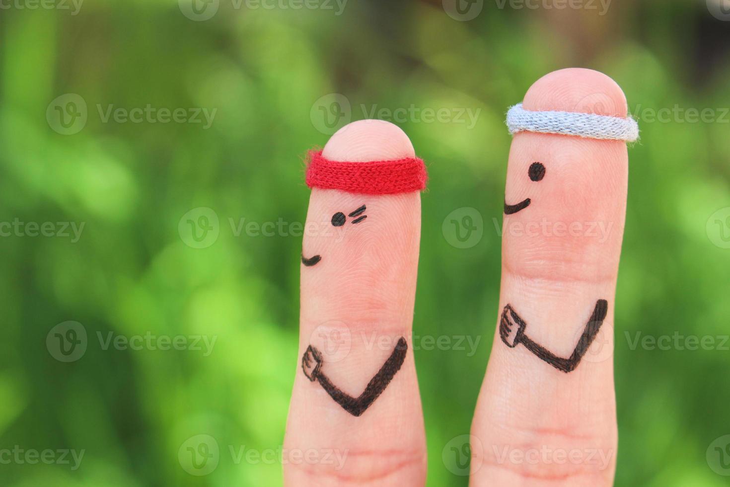 les doigts art de une content couple dans des sports. concept de Hommes et femmes sont en cours d'exécution. photo