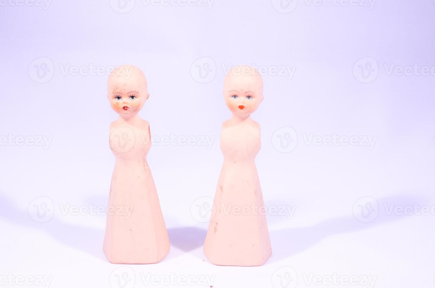 poupée figurines sur lumière Contexte photo
