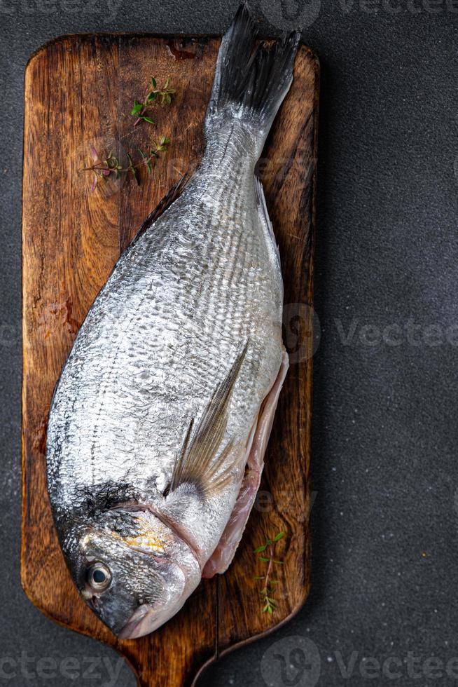 brut poisson mer brème Frais Fruit de mer repas nourriture casse-croûte sur le table copie espace nourriture Contexte photo