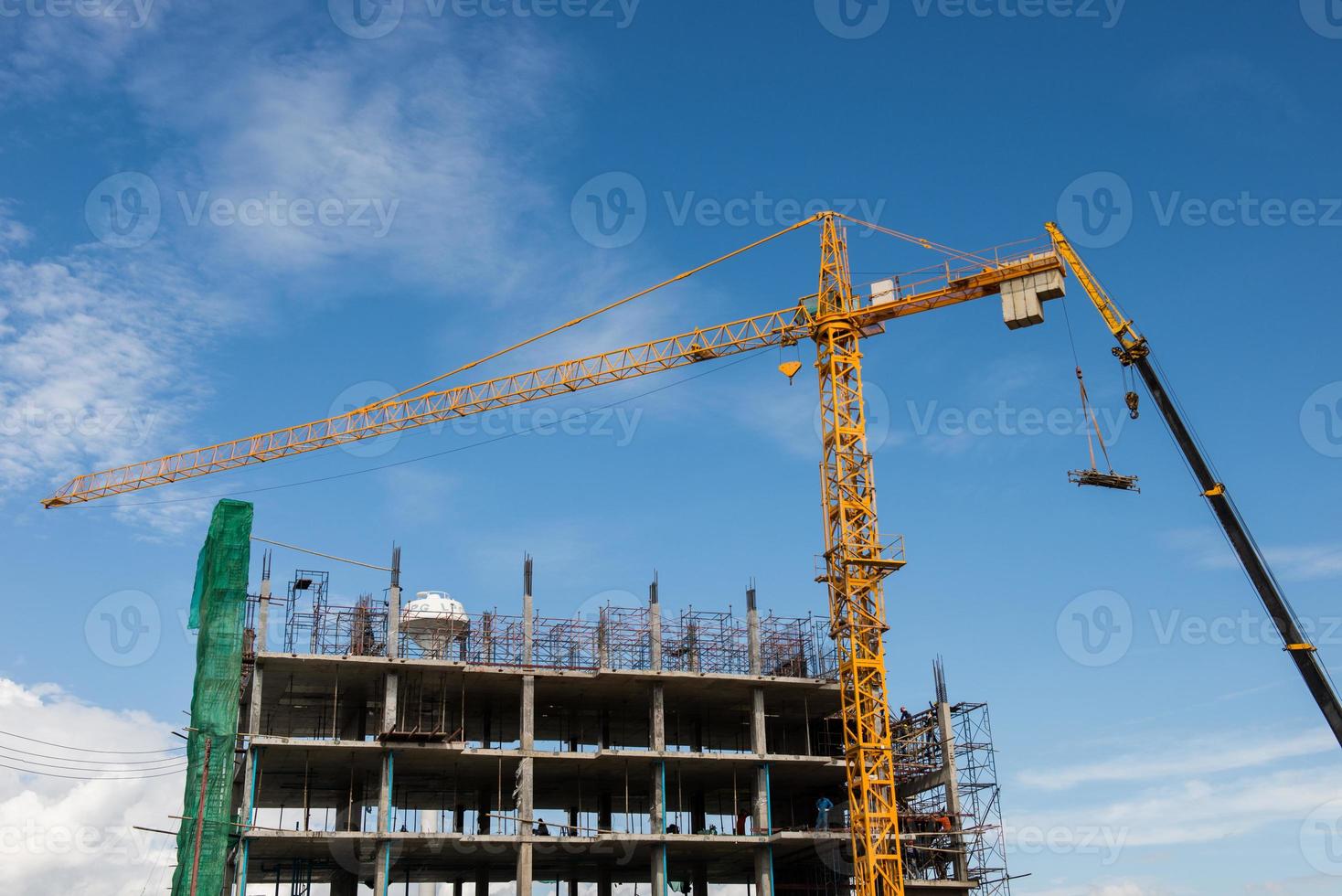 gros Jaune grue dans construction site photo