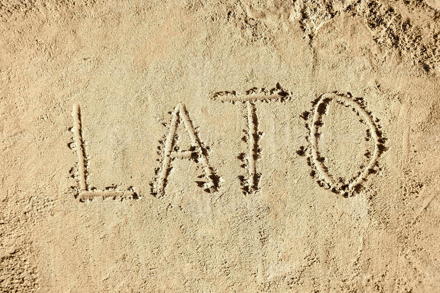 été dans polonais - mot sur le sable photo