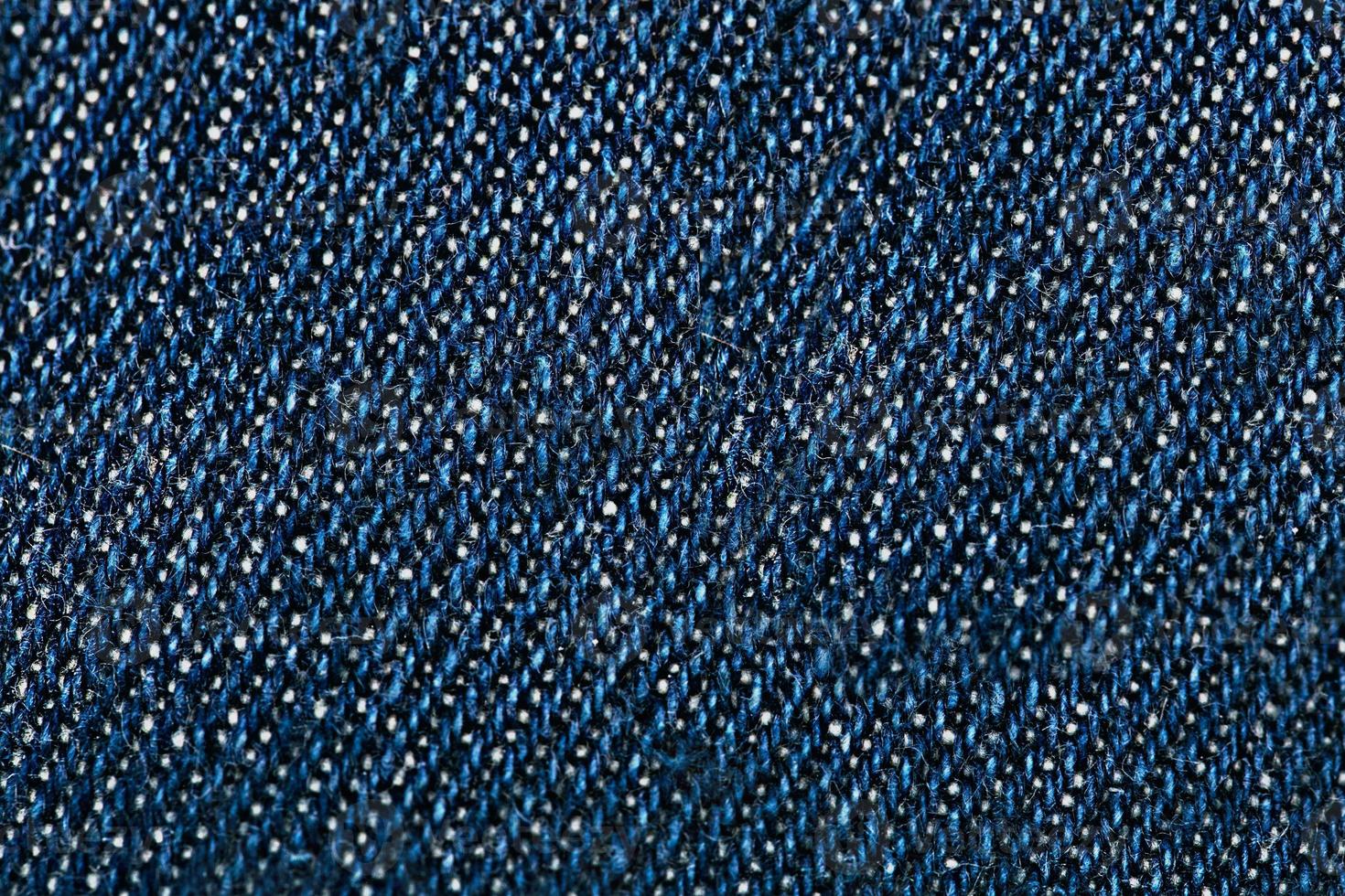 uniforme texture de denim foncé bleu en tissu photo