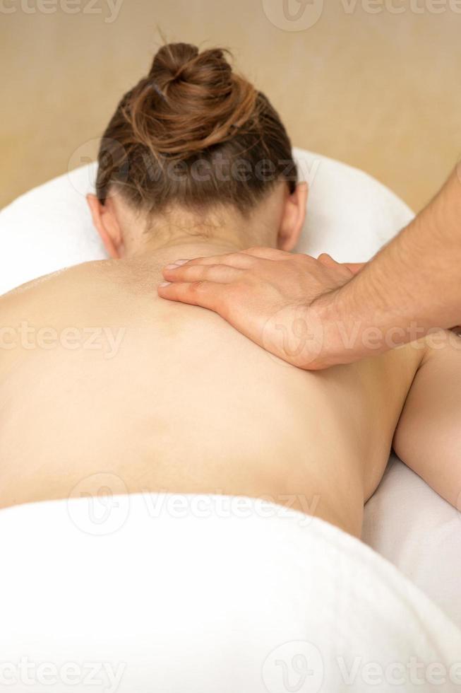 masseur masser retour de femme photo