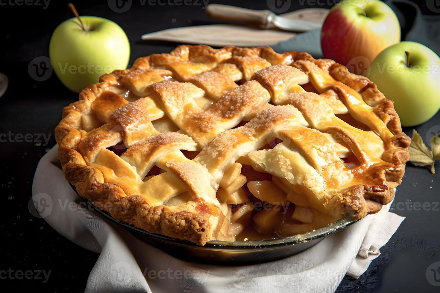 une tarte avec une treillis croûte est assis sur une table suivant à une panier de pommes photo