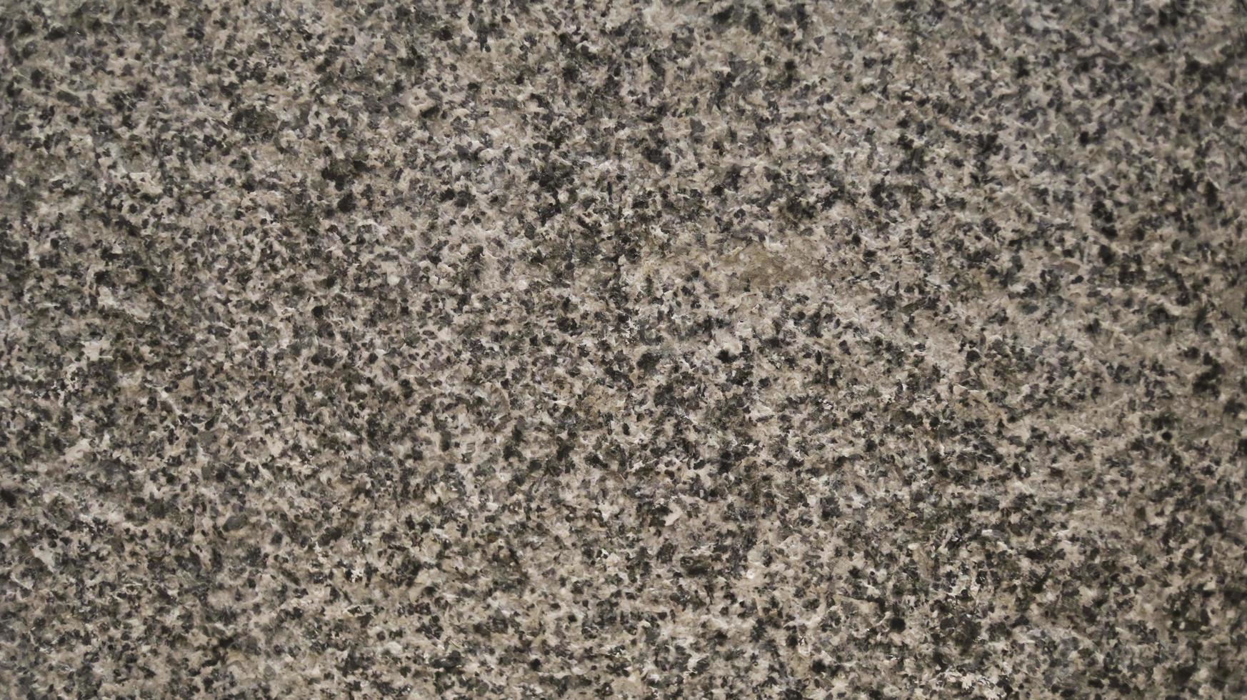 rugueux gris granit texture tuile béton. photo
