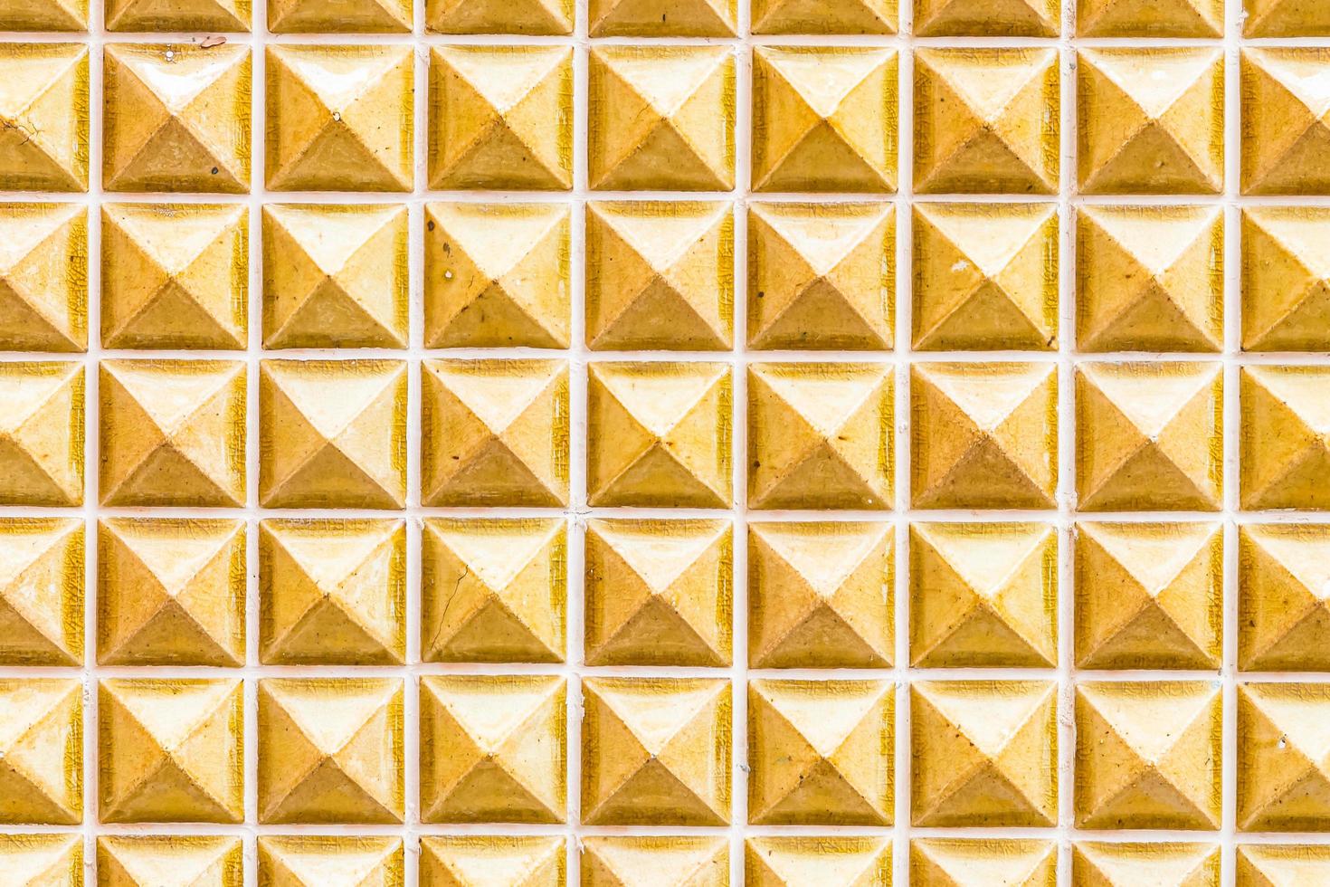 Texture de mur de carreaux de marbre jaune pour le fond photo